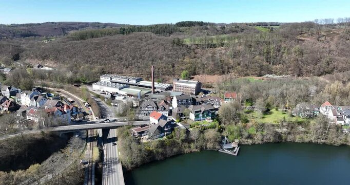 industrial factory building at Beyenburger Stausee, Wuppertal, Germany aerial industrial view.