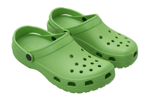 Isolated Pair of Green Clogs with Holes and Textured Soles