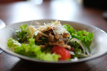 pour soy sauce over the salad egg salad with tuna Fresh salad with vegetables, dressing pouring over for vibrant taste