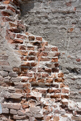 Weathered Brick and Stucco Wall

