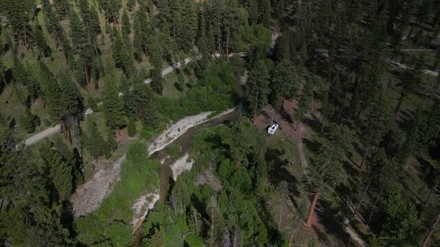 Aerial of RV camped in beautiful Bitterroot national forest in Montana in summer