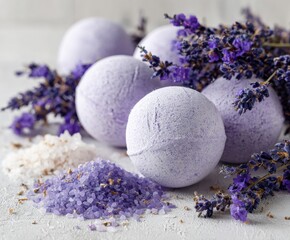Lavender bath bombs and sea salt with lavender flowers on white background