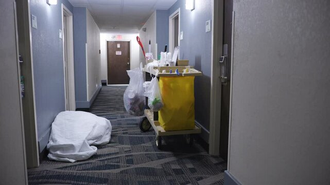 Cleaning cart sitting in hotel between rooms 4k
