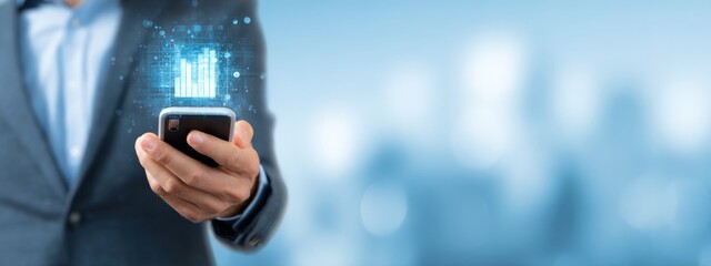 Businessman Using Smartphone With Digital Data and Graphs Overlay for Technology and Communication Concept in Modern Office Environment
