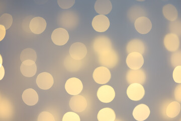Warm bokeh lights create an inviting atmosphere for festive gatherings and celebrations