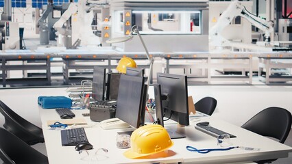 CAD program on PC monitor in photovoltaics factory used for production line design. Simulation...