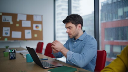 Busy office staff typing laptops creating project closeup. Confident man woman