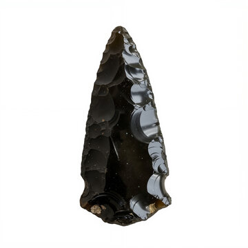North American Indigenous Object 3z Ultra-sharp obsidian Clovis point arrowhead on white marble surface. Glossy volcanic glass with pressure flake scars visible. Ideal for history textbooks