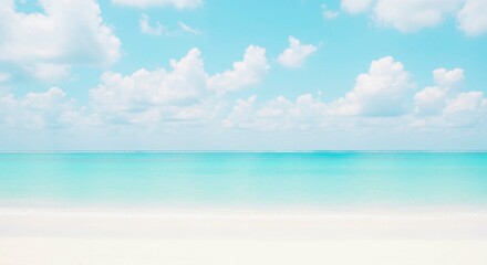 Obraz premium A serene beach scene with white sand, turquoise water, and cloudy sky view
