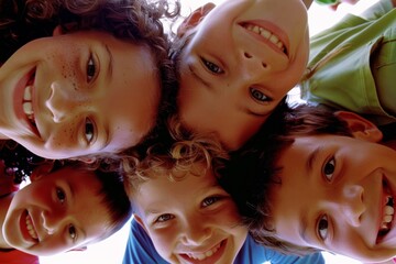 Group of children smiling and looking at the camera in a low angle view