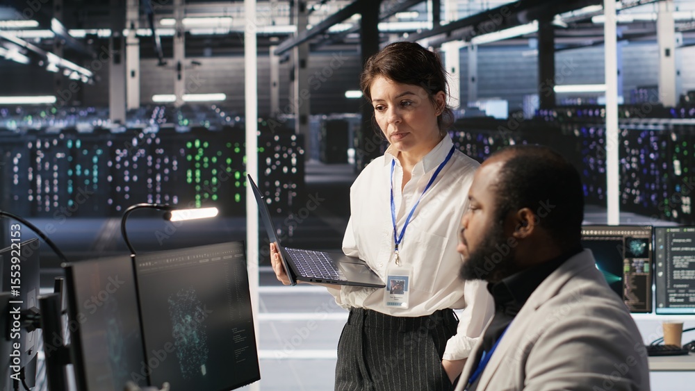 Poster happy data center manager providing positive feedback to engineer developing neural networks softwar