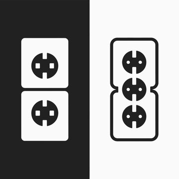 Two vertical electrical outlets on a black background and three on a white background