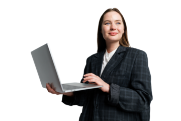 Professional woman in formal attire confidently using a laptop against a clean, white background, portraying modern business culture