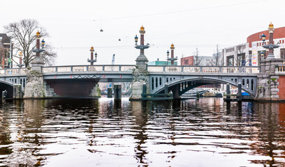 The spectacular city of Amsterdam, its canals, streets, bridges, buildings and unique magic