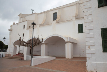 Traditional church surrounded by trees, Menorca, Spain