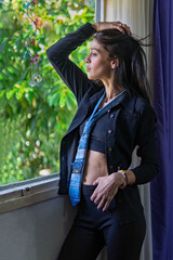 Woman with unique fashion looking outward