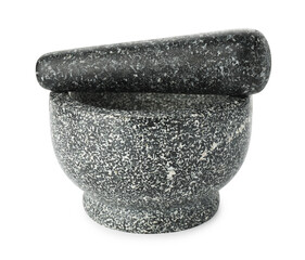 Stone mortar and pestle isolated on white