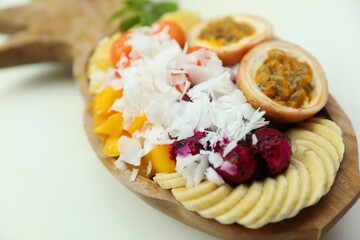 Different fresh fruits on white table, closeup