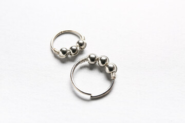 Hoop earrings on white background