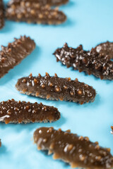 Raw sea cucumber trepang in water.