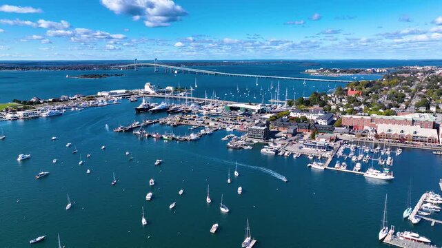 Goat Island aerial view including Goat Island Marina and Newport Harbor Island Resort with Claiborne Pell Newport Bridge at the back in Narragansett Bay, Newport, Rhode Island RI, USA. 