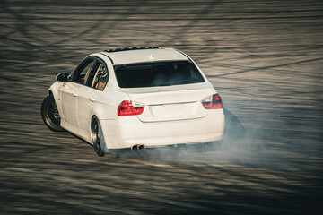 White Car Drifting Sideways