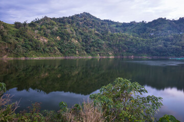 mountain lake quarry lake idyll with water reflections