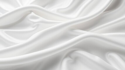 Elegant folds of pure white fabric cascade in a soft, inviting display of texture and subtle light play