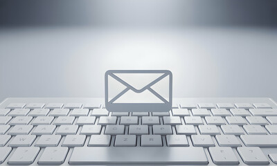 Email Concept: Keyboard and Email Symbol in White Backdrop
