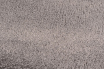 A fuzzy gray fabric with a lot of texture