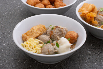 Bakso popular Indonesian foods, Beef Meatballs with noodles, dumpling and fried tofu