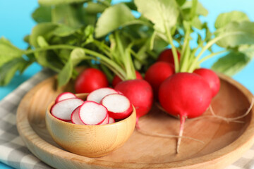 Many ripe radish on color background