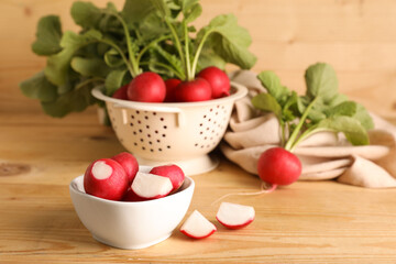 Composition with ripe radish on wooden background