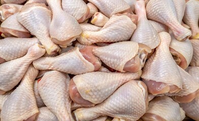 Fresh raw chicken drumsticks background. Suitable for marketing or business purposes