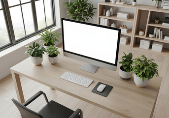 Modern workspace with a blank computer screen and lush green plants.