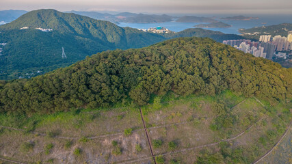 June 8 2025 Scenic View of Lush Green Hills and Distant Mountain Ranges