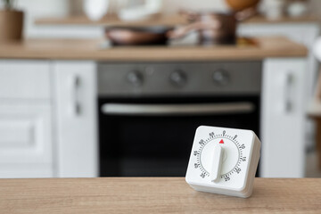 Kitchen timer on table in room, closeup