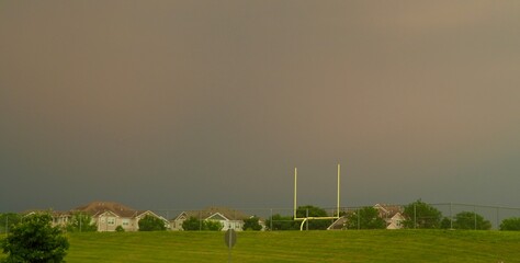 Storm Causes Football Game to Be Called.

Solid line of thunderstorms causes a football game to be...