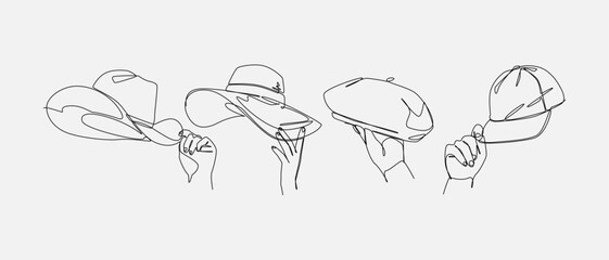 Set of drawing of hands holding cowboy hat, straw hat, beret, and baseball cap in continuous one line drawing style. Clothing, headwear, fashion concept. Editable line. Vector illustration