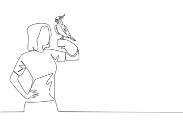 Single one line drawing grey cockatiel perched on hand of woman. Bird with characteristic crest on its head. A gentle and loving animal. Woman Holding Bird. Continuous line design graphic illustration
