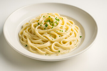 Fettuccine Alfredo served in a classic white pasta bowl with parsley