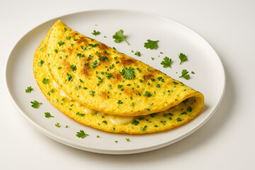 Omelette with herbs and cheese on a white plate