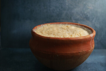 Creamy rice pudding served in traditional clay pot