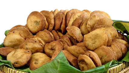 Delicious Indonesian street food, weci cake, displayed in a traditional basket on a white table