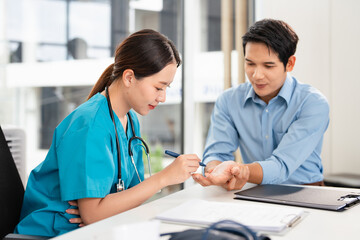 Fototapeta premium Medical, hand wrist pain and a man with doctor in the hospital, talking during a consultation. Healthcare, insurance or anatomy . a patient in a clinic with a medicine professional