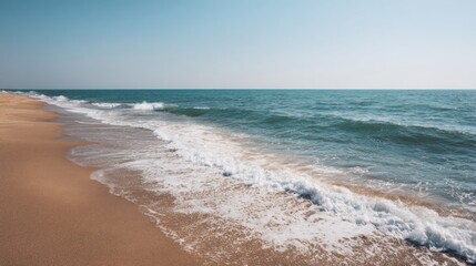 Calm seascape view with beach and foamy waves rolling on the shore