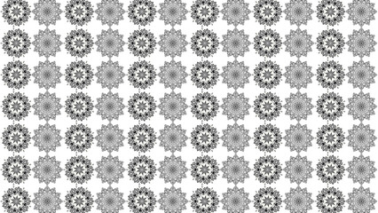 Seamless pattern of black and white floral mandalas arranged in a symmetrical grid layout design
