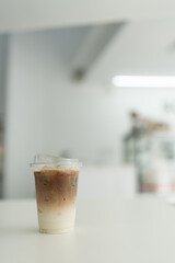Close up of iced latte two layer of combination. Relaxing drink with selective focus.