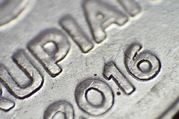 A metal coin with the essence of finance and banking