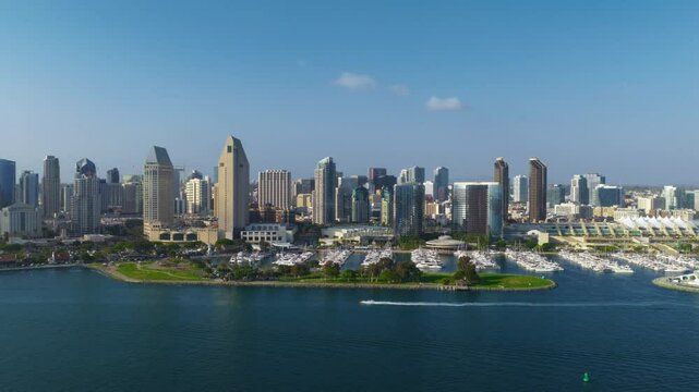 Stunning aerial footage beautifully showcases the vibrant skyline of Downtown San Diego, revealing impressive skyscrapers, bustling marinas, and unforgettable views of the picturesque waterfront area